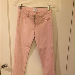 Pale pink skinny jeans